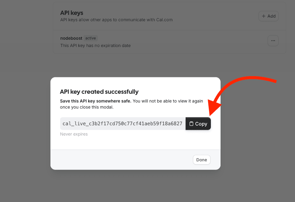 Cal.com API key success modal with the Copy button highlighted